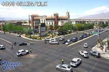 Construction cones and workers in the intersection