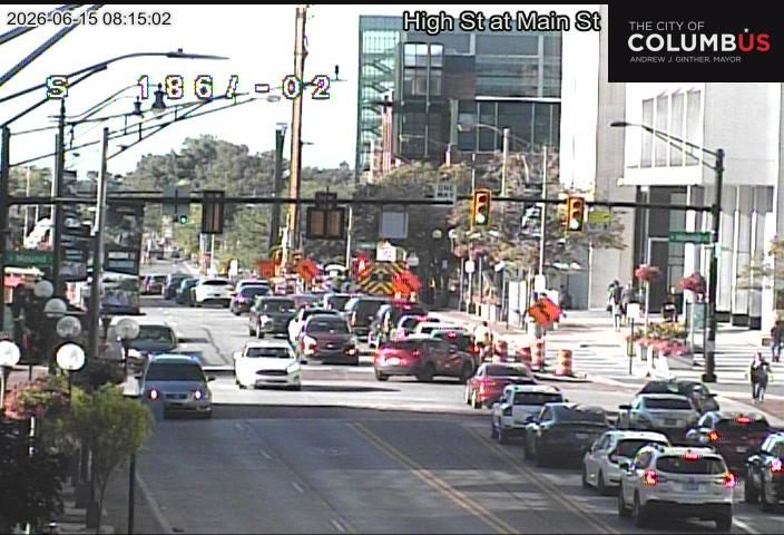 Fire truck and emergency vehicles on scene at High St and Main St.