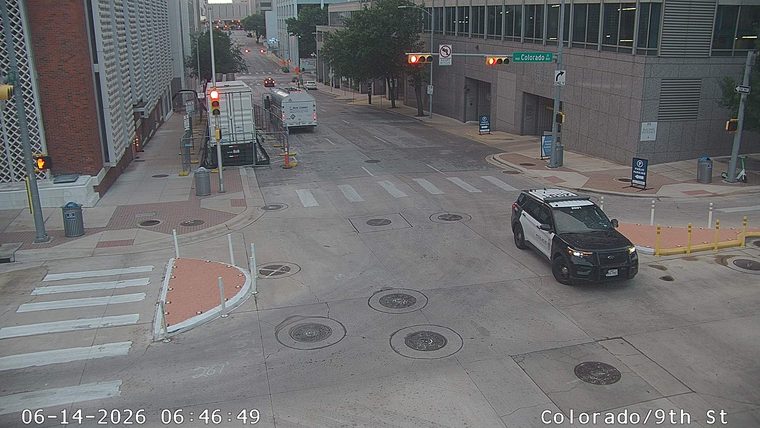Police car is present at the intersection of Colorado and 9th Street.