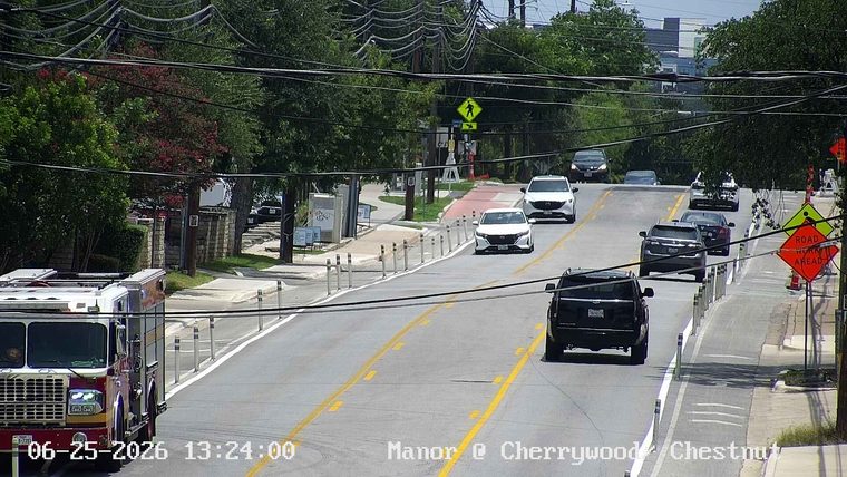 Fire truck on the left side of the roadway