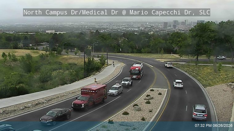 Red and white ambulance on the roadway