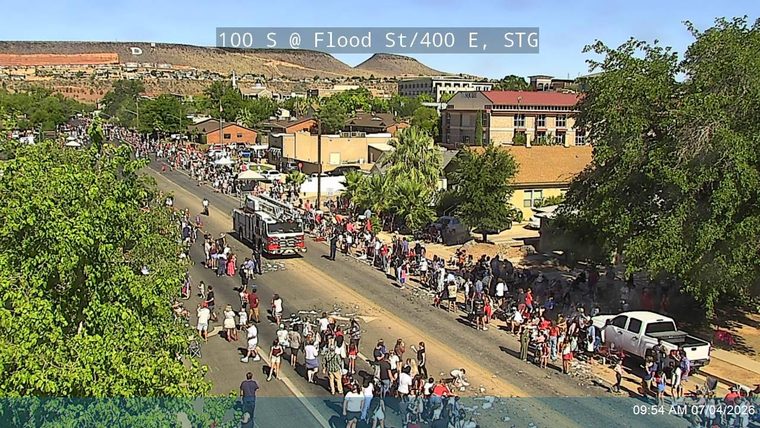 Fire truck and crowd on the roadway