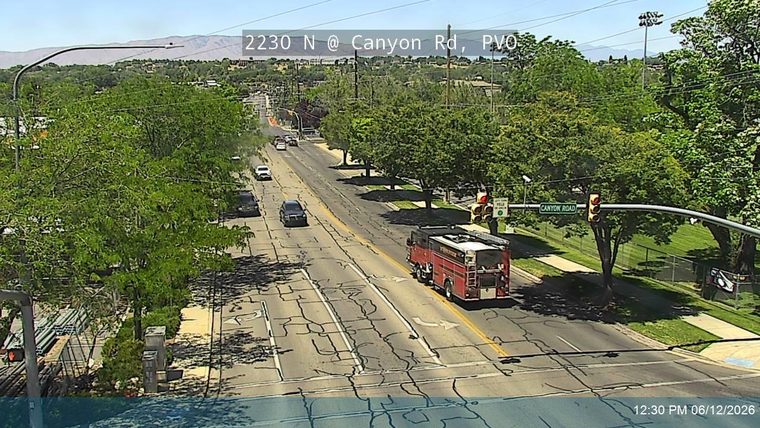 A fire truck is stopped on the roadway, indicating a responder incident.