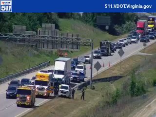 Fire truck and other emergency vehicles on the right shoulder