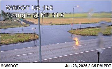 Flooding across the roadway at the intersection
