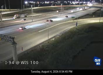 Tow truck and a vehicle on the right shoulder