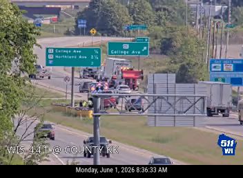 Emergency responders and vehicles on the roadside, possibly attending to an incident.