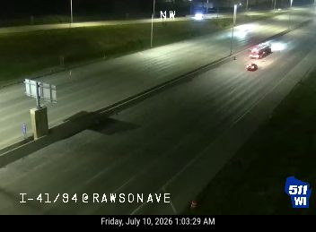 Fire truck and another vehicle stopped in the right lane