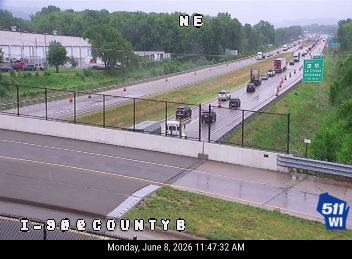 Emergency responders and traffic control are present on I-90 near County B.