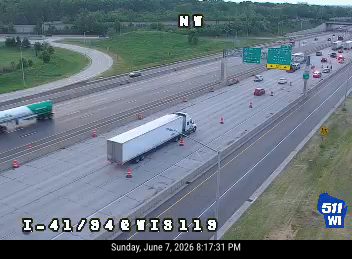 Emergency responders and traffic cones on I-41/94 eastbound, indicating an incident.