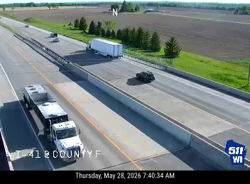 Large debris object in the right lane of the highway.