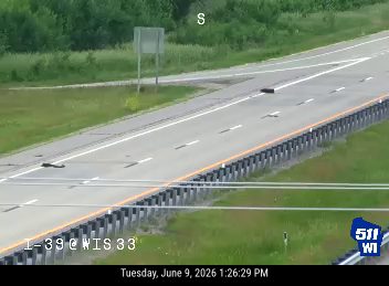 Debris scattered on the roadway, potentially hazardous to traffic.