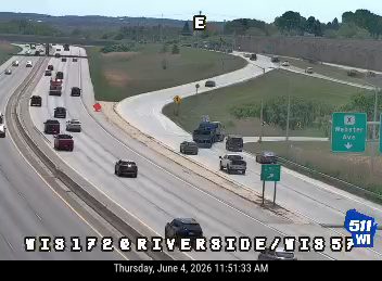 Emergency vehicles and cones on the highway, indicating a responder incident.