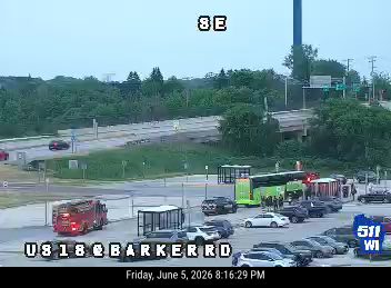 Fire truck and emergency vehicles on scene at U.S. 18 and Barker Road.