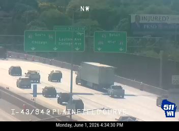 Police and fire vehicles on the highway, likely responding to an incident.