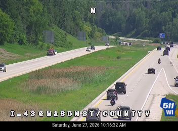 Police car and tow truck on the right shoulder