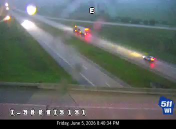 Emergency vehicle on the roadway, possibly responding to an incident.