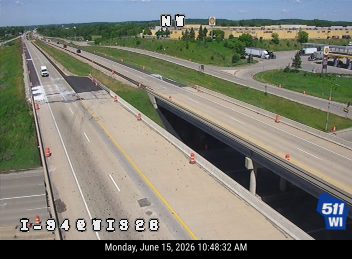 Construction cones and asphalt work in the left lane