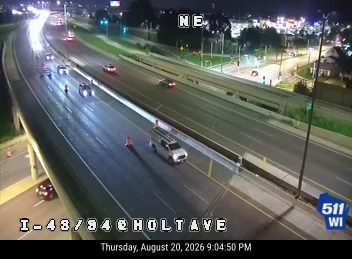 Construction cones and a service vehicle in the right lane