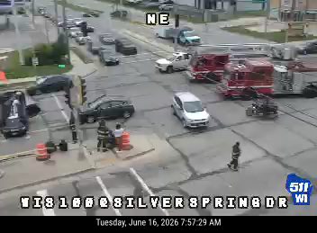 Fire truck and emergency personnel at intersection