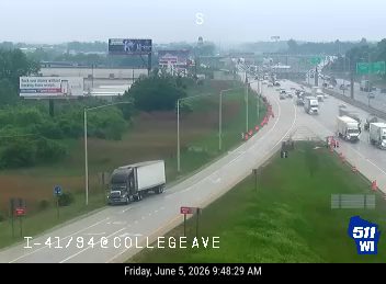 Emergency responders and cones on the right shoulder of I-41/94 at College Ave.