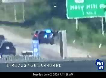 Vehicle appears to have crashed into a barrier on the highway.
