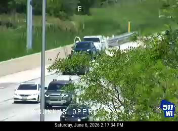Two vehicles appear to be involved in a collision on the roadway.