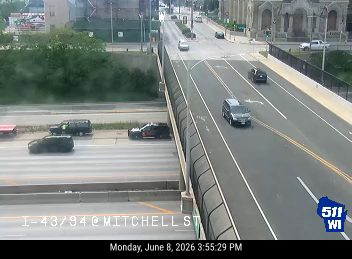 Two vehicles appear to be involved in a crash on the highway.