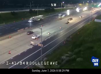 Emergency responders appear to be on scene with cones and barriers on the highway.