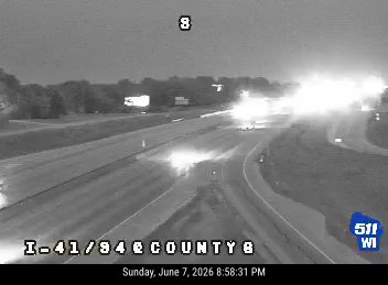 Multiple vehicles involved in a crash on the highway, causing traffic disruption.