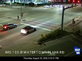 Multiple police cars with lights on in the intersection