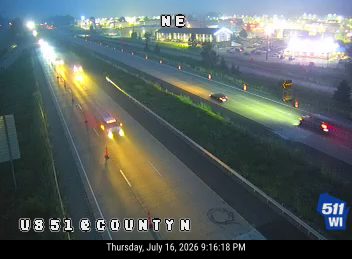 Construction cones and equipment in the left lane