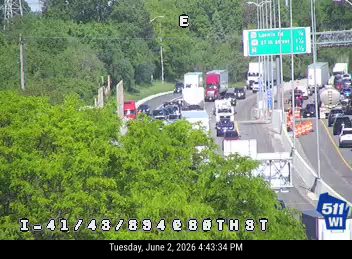 Multiple vehicles stopped in traffic, possible multi-vehicle crash ahead.