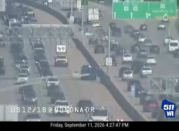Vehicle on its side in the left lanes