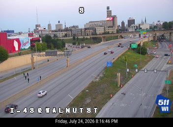 Pedestrians on the roadway in the left lane