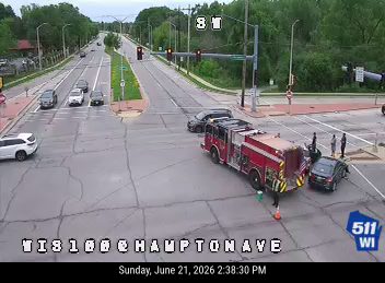 Fire truck and two cars at intersection