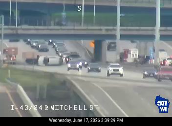 Vehicle on its side in the left lane