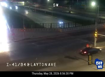 Police car with lights on at I-41/94 @ Layton Ave.