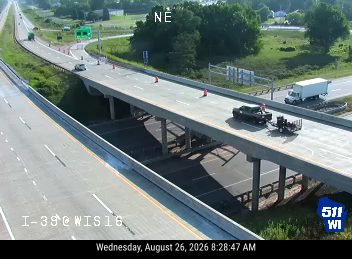 Construction cones and a utility truck in the right lane
