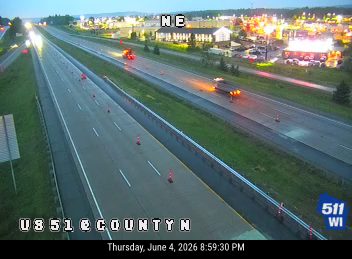 Emergency vehicles and cones on highway U851 at County N.