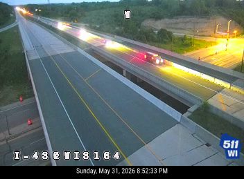 Emergency vehicle on elevated highway, possibly responding to an incident.