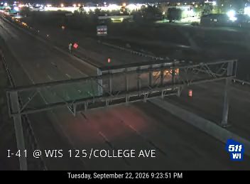 Construction cones and a person in the left lane