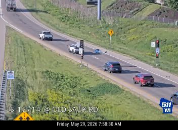 Two vehicles involved in a crash on the roadway.