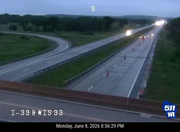 Emergency responders and vehicles on the highway, possibly directing traffic.