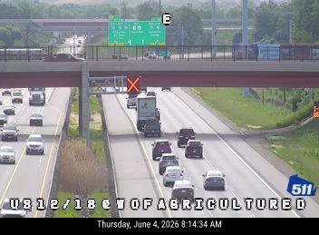 Two vehicles appear to be involved in a crash on the highway.