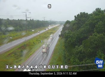 No incident — heavy rain and wet roadway