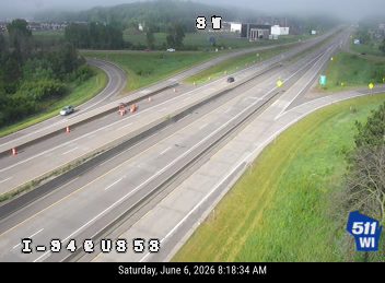 Emergency responders and cones on I-94 EB near exit 58.