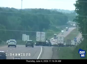 Multiple vehicles involved in a crash blocking lanes on I-94.