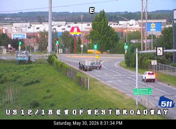 Two vehicles appear to be involved in a collision on the roadway.