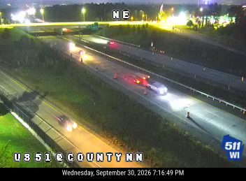 Construction cones and a vehicle in the right lane